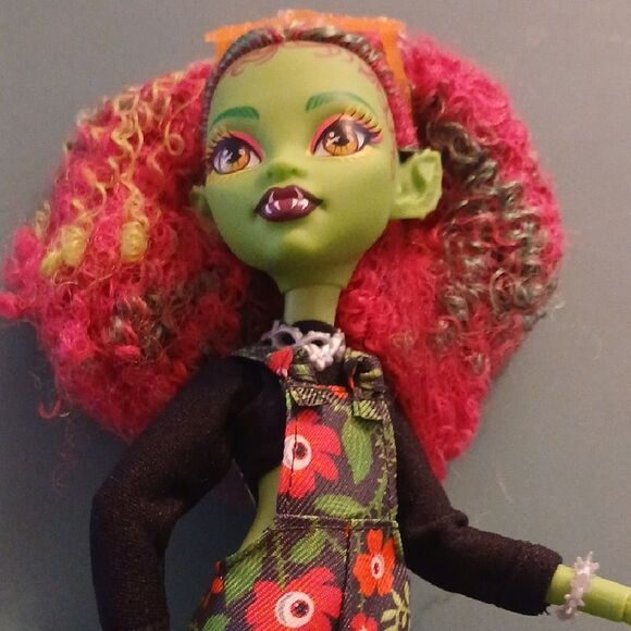 Colorful Doll with Floral Overalls - Picture 2 of 3